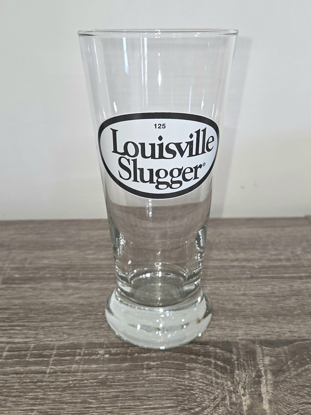 Louisville Slugger Clear Beverage Glass with 125 Oval Logo and Weighted Base 7".